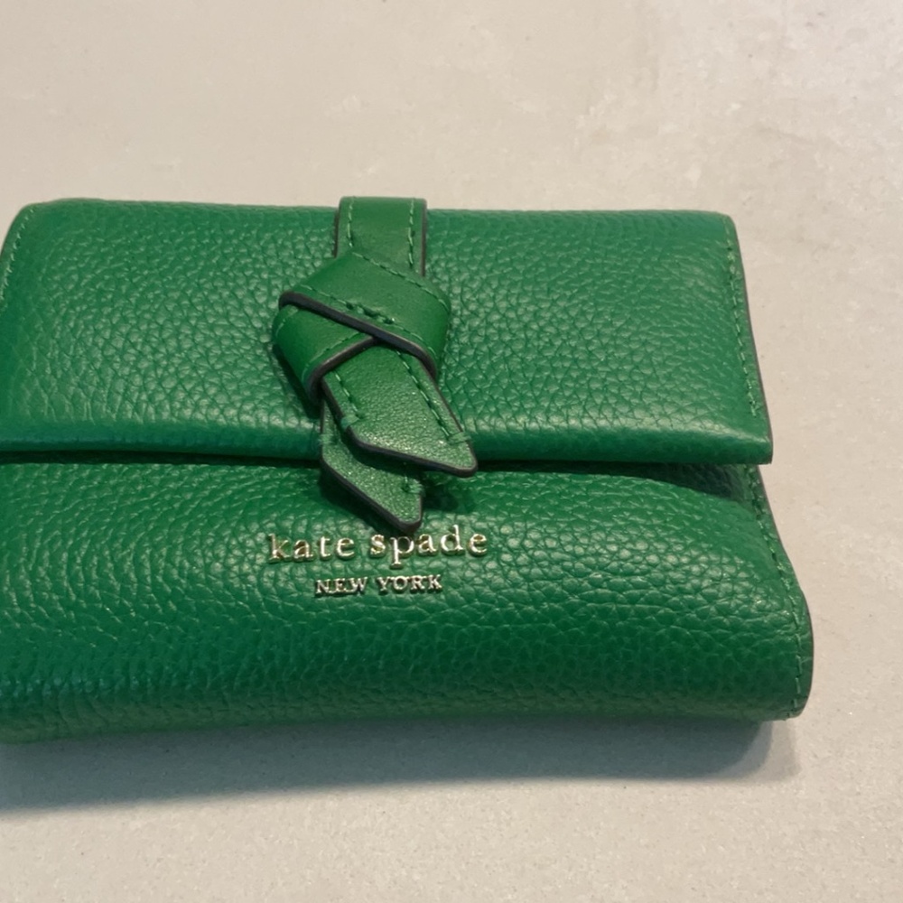 kate spade green pebbled leather wallet with knotted strap